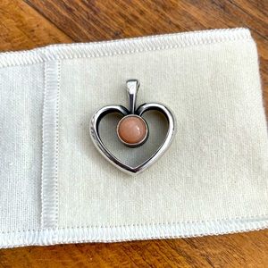 Retired James Avery open heart pendant.